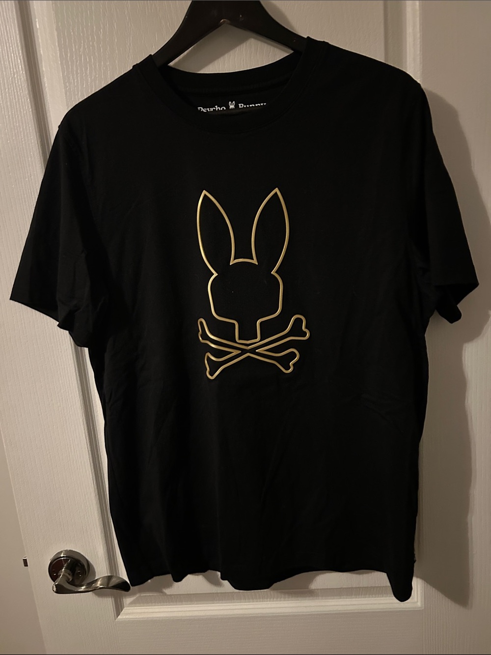 Psycho Bunny Black T‑Shirt with Gold Bunny Skull Graphic